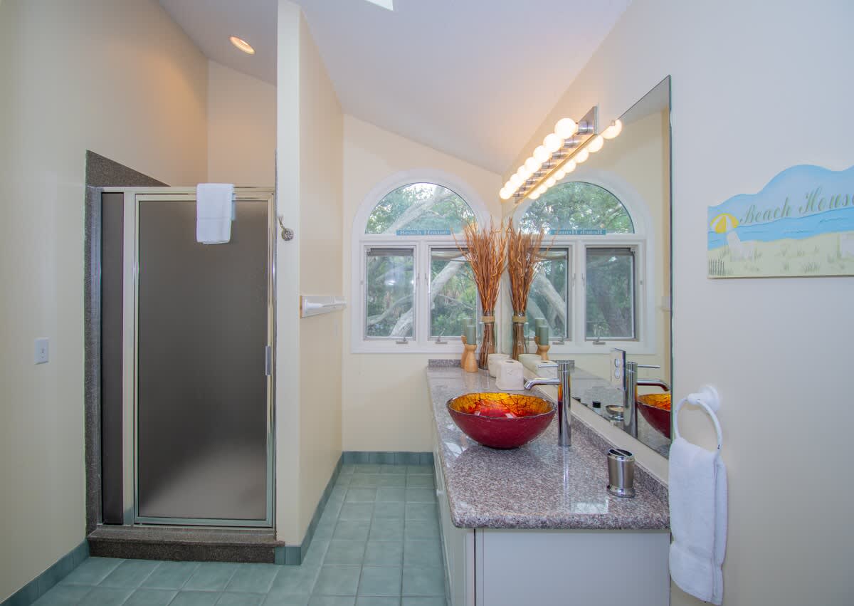 Upstairs Hall Bathroom with a Walk-In Shower