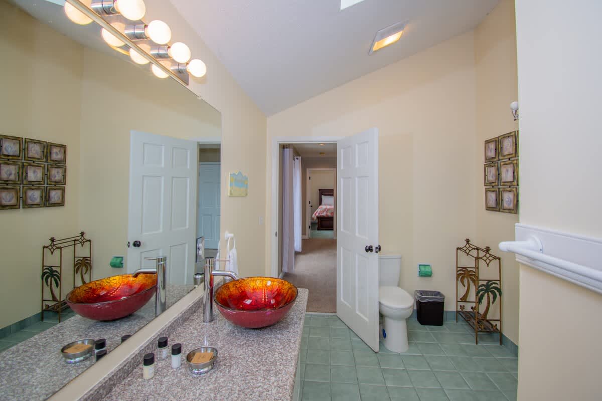 Upstairs Hall Bathroom with a Walk-In Shower