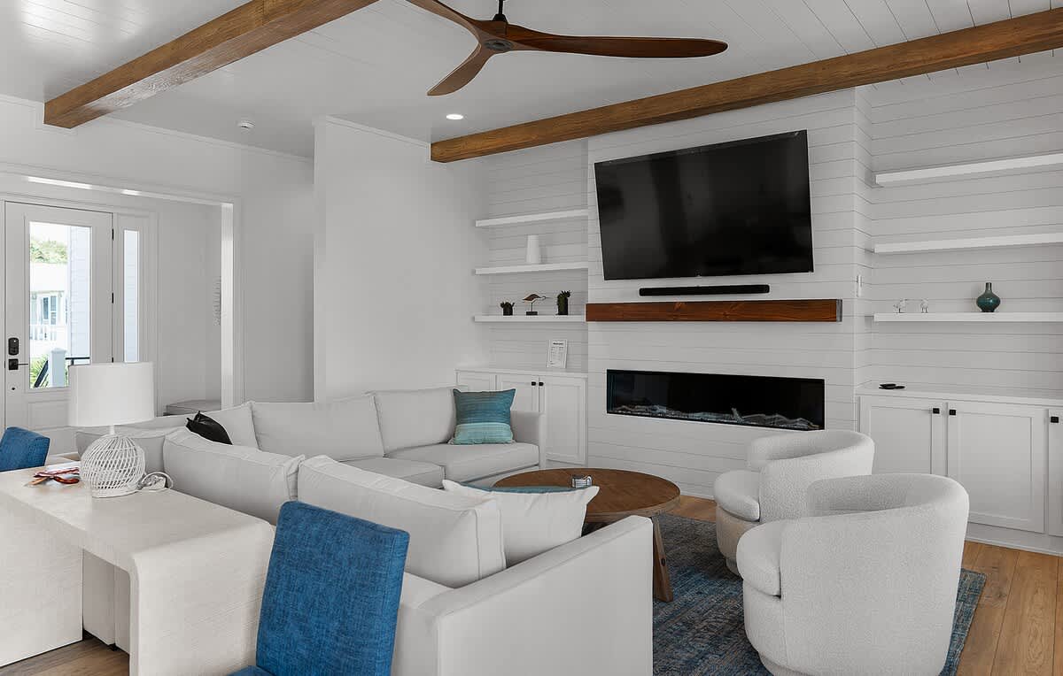 Living Room with Sectional and Access to Screened in Porch 