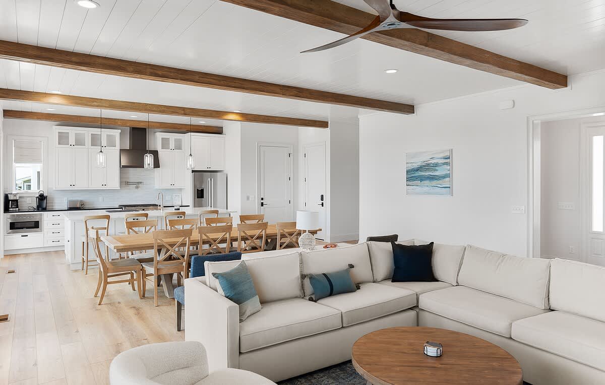 Living Room with Sectional and Access to Screened in Porch 