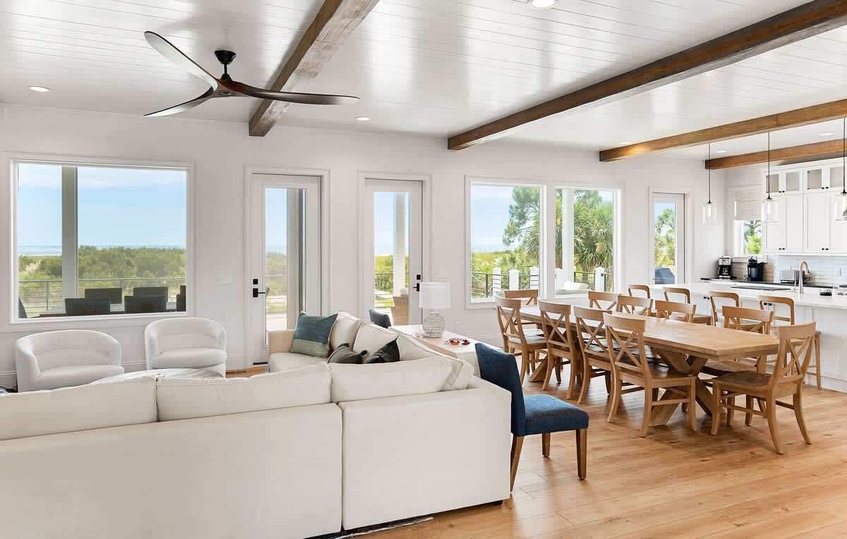 Living Room with Sectional and Access to Screened in Porch 