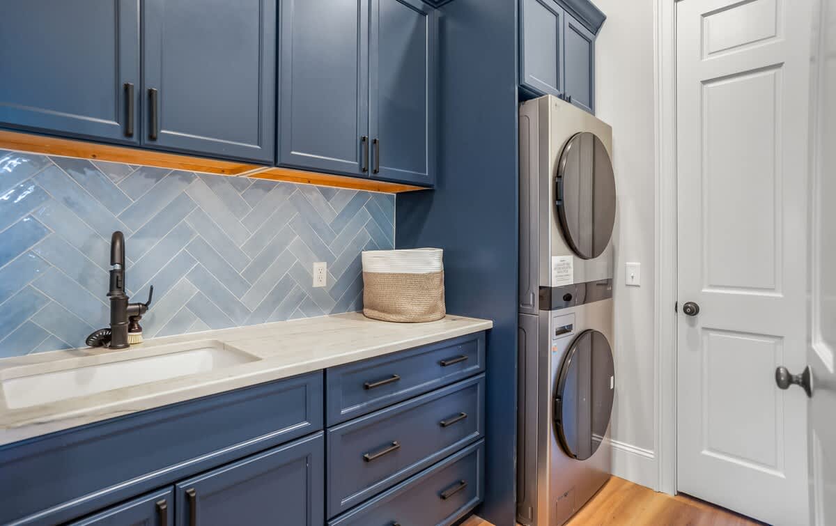 Laundry Room with Full Size Stackable Washer and Dryer 