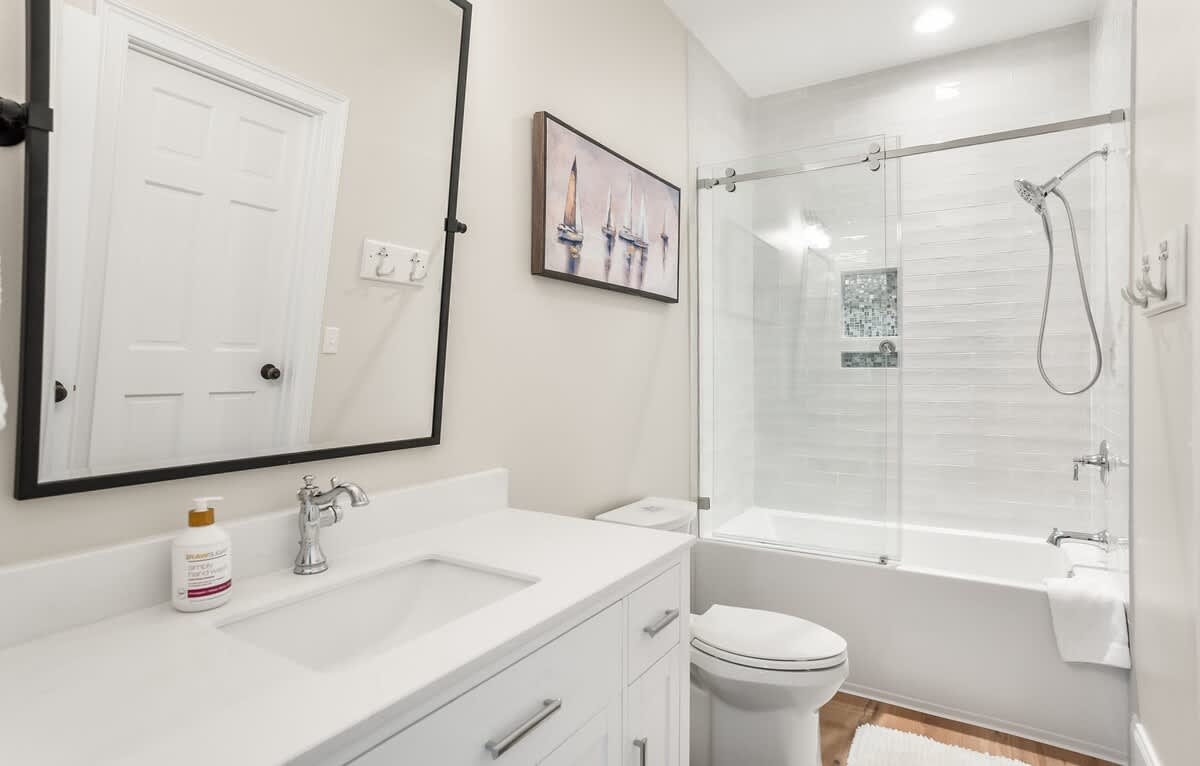 Full Bathroom with Shower/Tub Combo. Bathroom can be Accessed from Hallway and Bedroom 