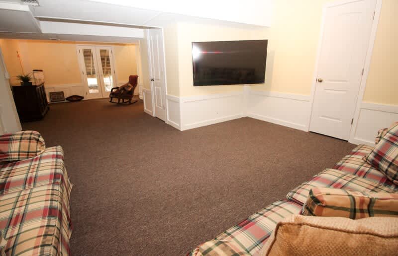 Ground-Level. TV Room. Opens to Driveway. 