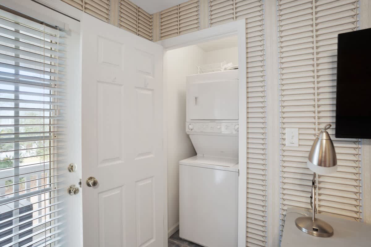 TV Bedroom with Laundry Area