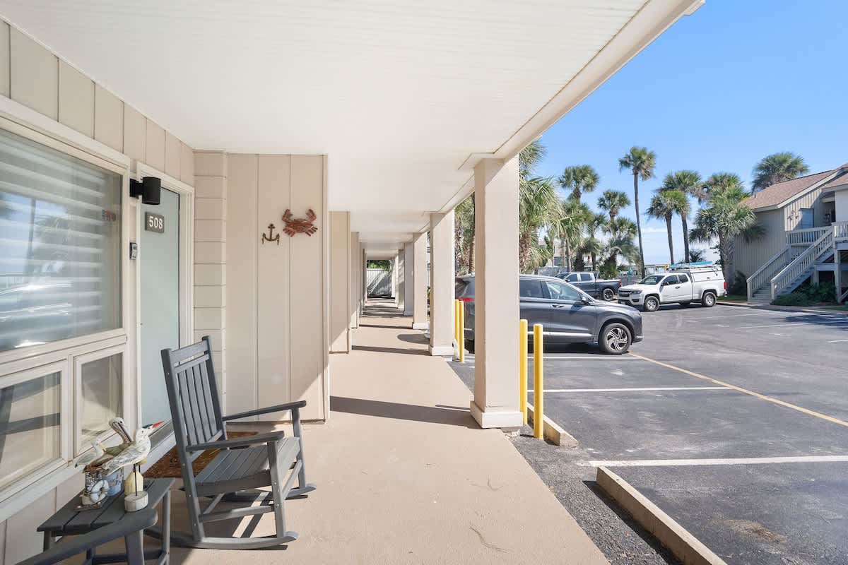 Front Patio Area with Seating and Parking