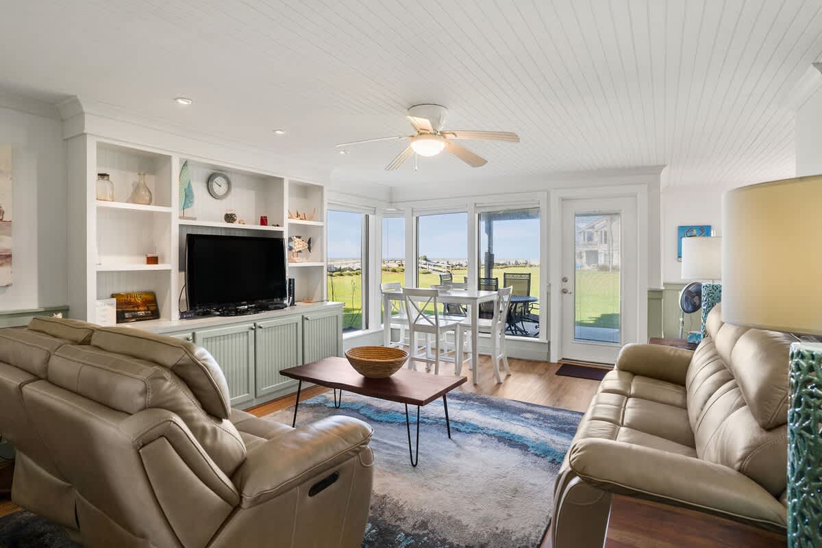 Living Room with Access to the Patio and Dining Areas