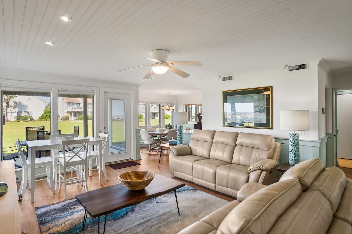 Living Room with Access to the Patio and Dining Areas