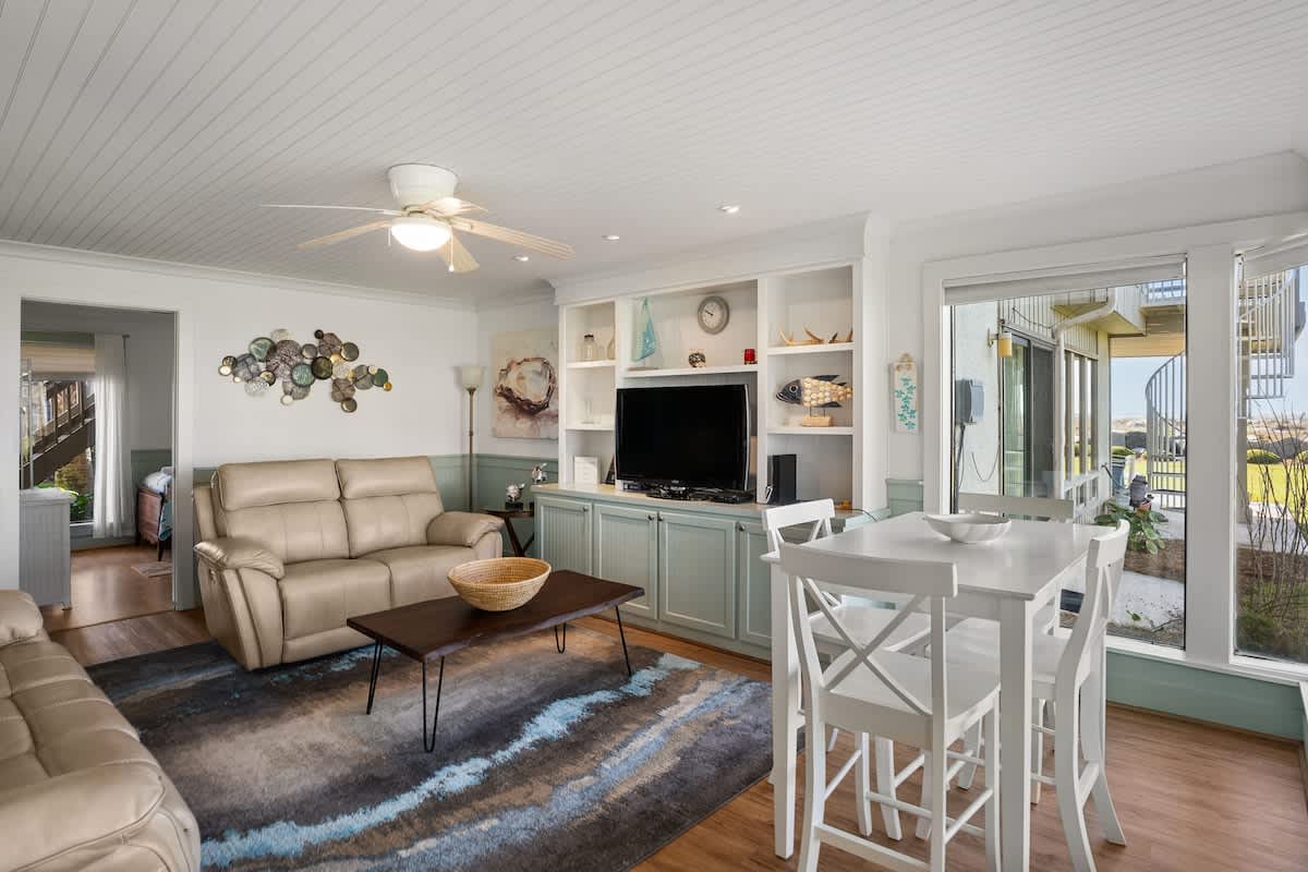 Living Room with Access to the Patio and Dining Areas