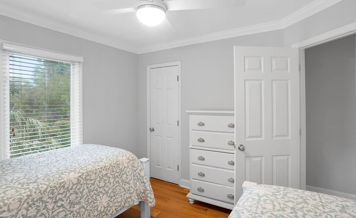 First floor guest bedroom with two beds