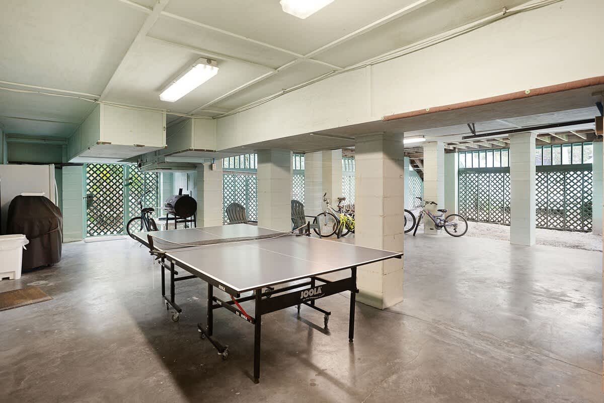 Huge garage with ping pong table and bikes