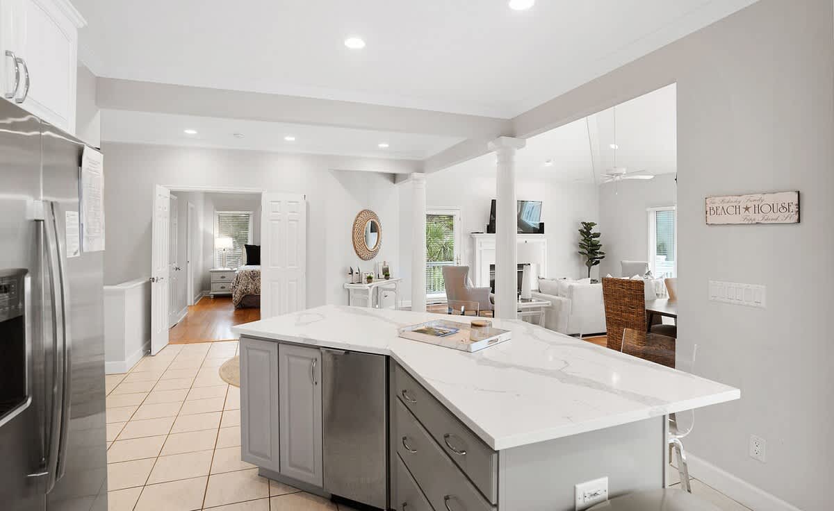 Open concept second floor living room, dining room and kitchen