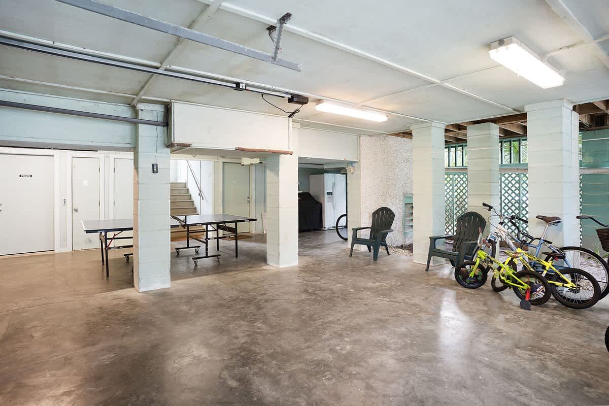 Huge garage with ping pong table and bikes