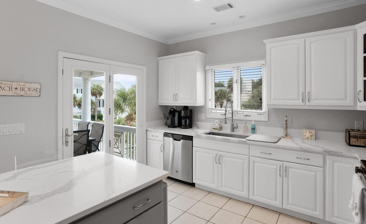 Open concept second floor living room, dining room and kitchen