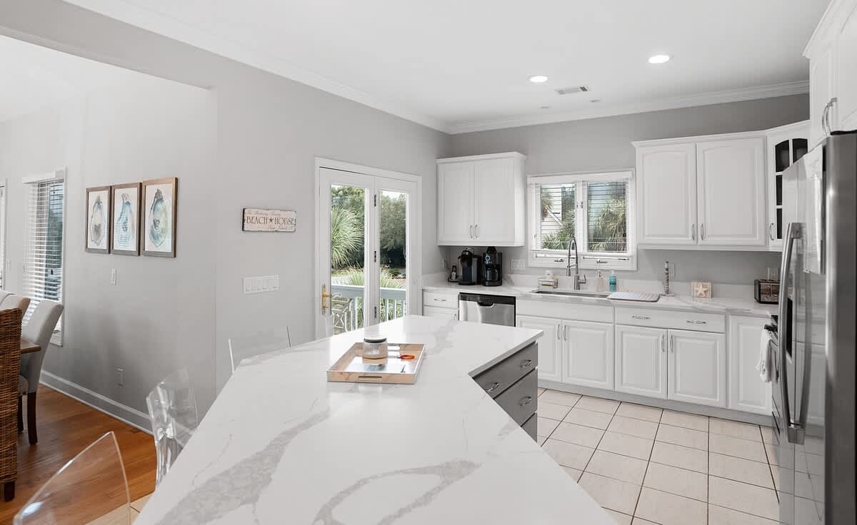 Open concept second floor living room, dining room and kitchen