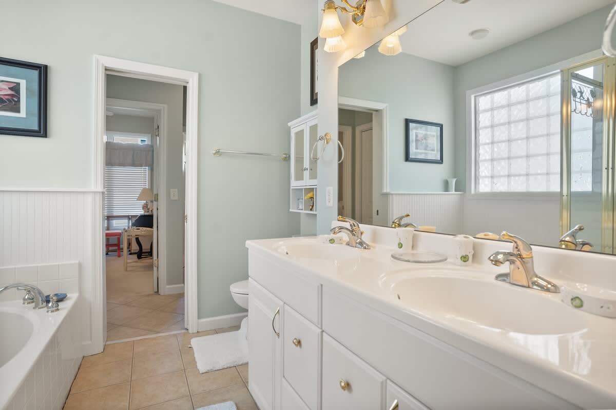 First floor primary bedroom with en suite bathrom