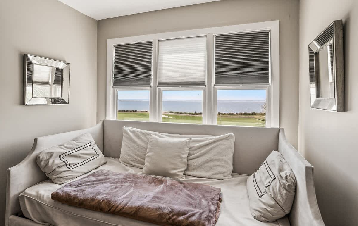 Second floor bedroom with en suite full bathroom and extra day bed