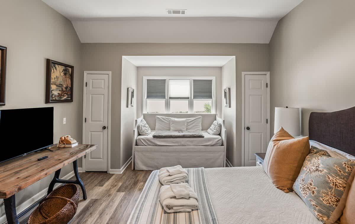 Second floor bedroom with en suite full bathroom and extra day bed