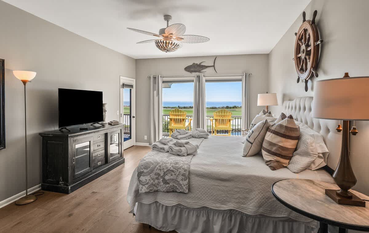 First floor primary bedroom and en suite full bathroom