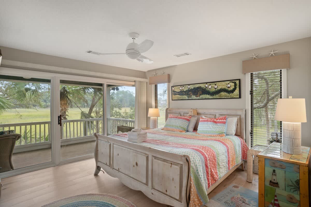Primary Bedroom with King Bed and Access to Marsh View Screened Porch