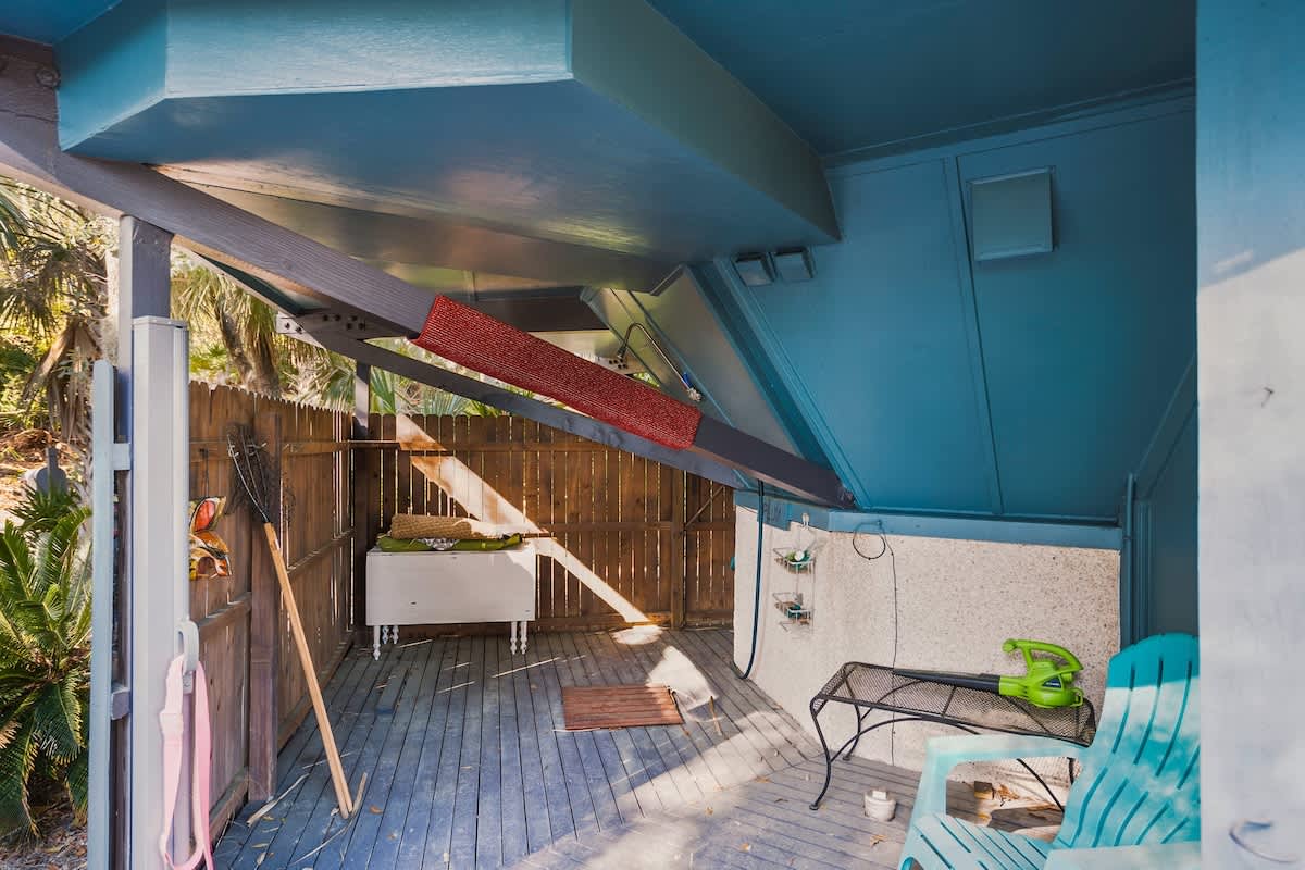 Outdoor shower and storage area