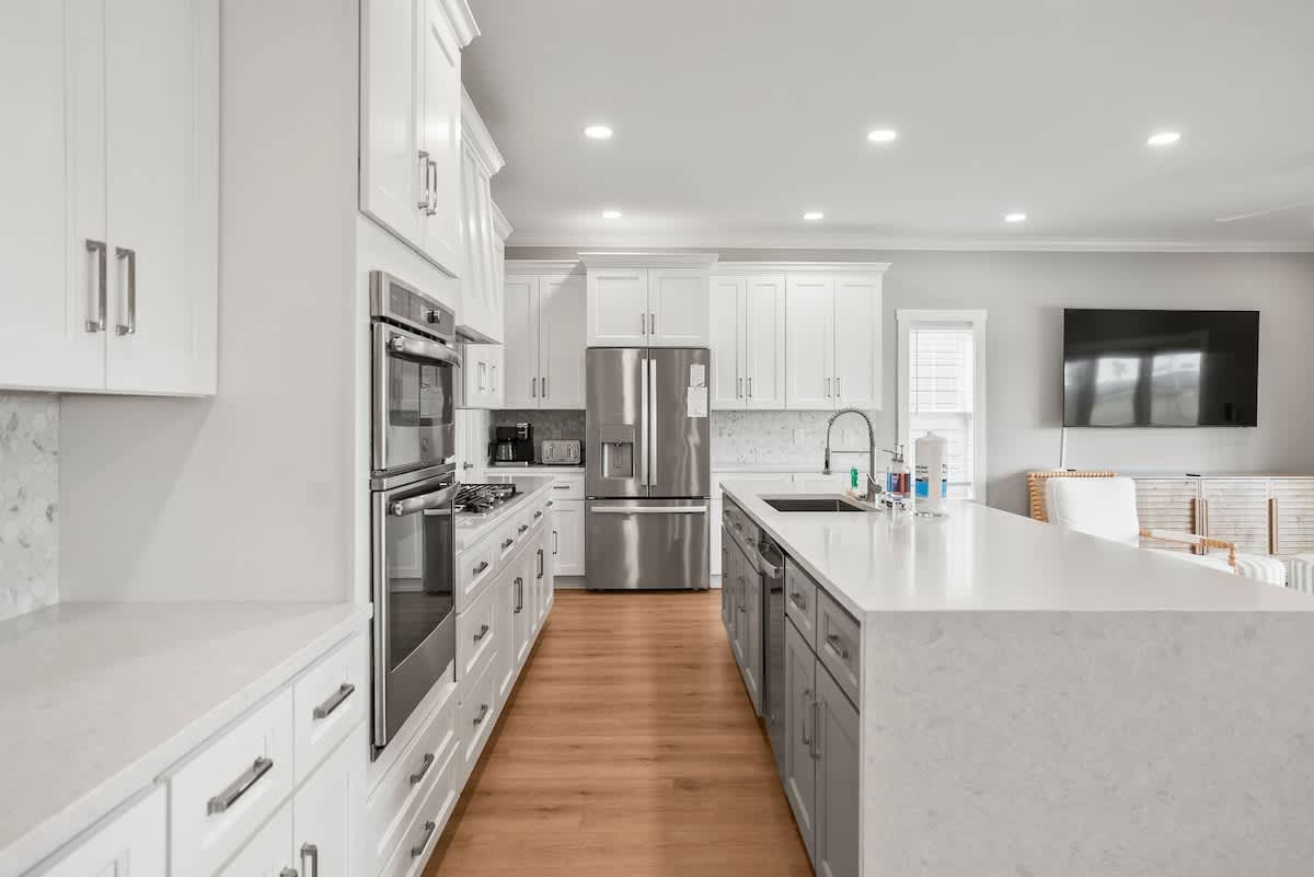 Modern kitchen with open concept dining and living room