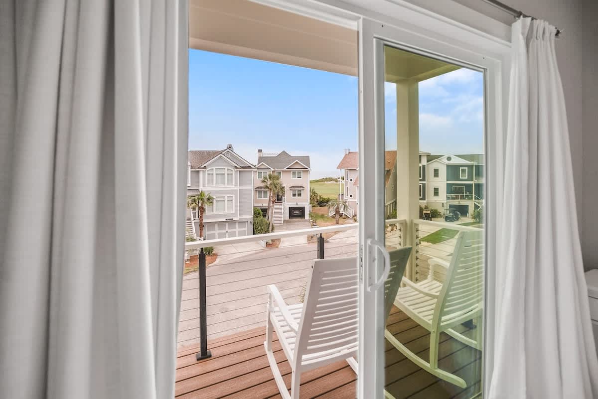 Second floor guest bedroom with en suite bathroom and balcony
