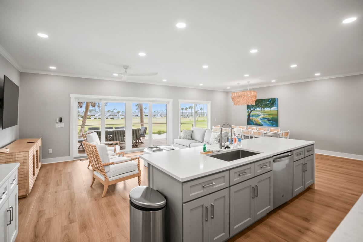 Modern kitchen with open concept dining and living room