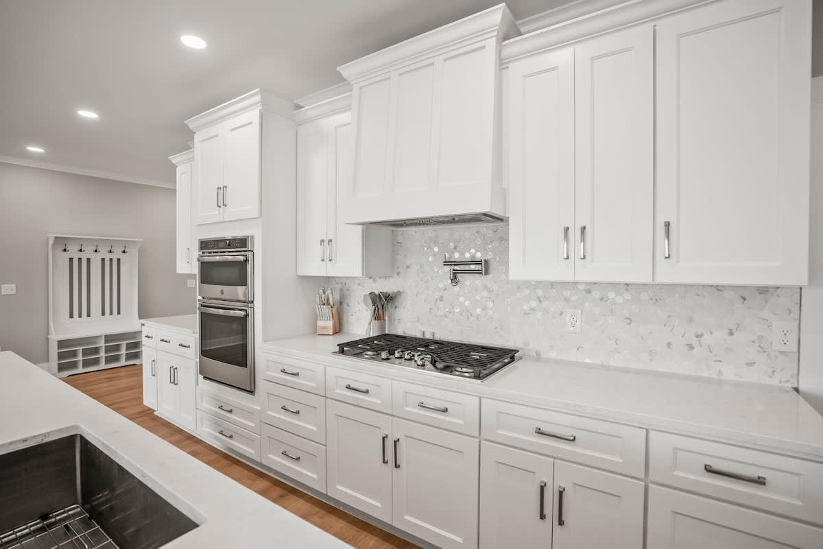 Modern kitchen with open concept dining and living room