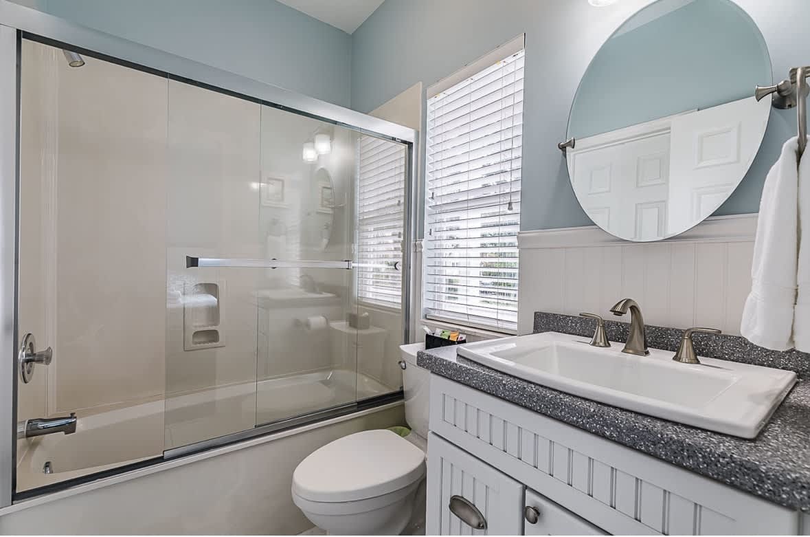 Guest En Suite Bathroom with Access to the Laundry Area