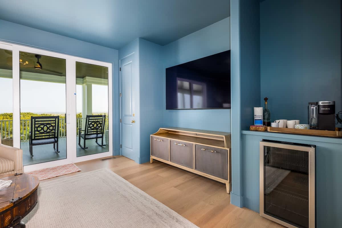 Sitting Room With TV and Deck Access 