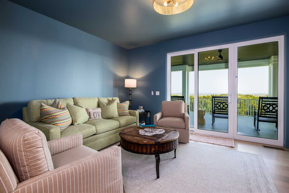 Sitting Room With TV and Deck Access 