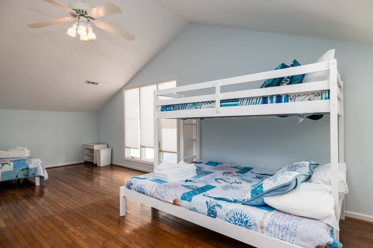 Second floor bunk room with ample guest sleeping arrangements