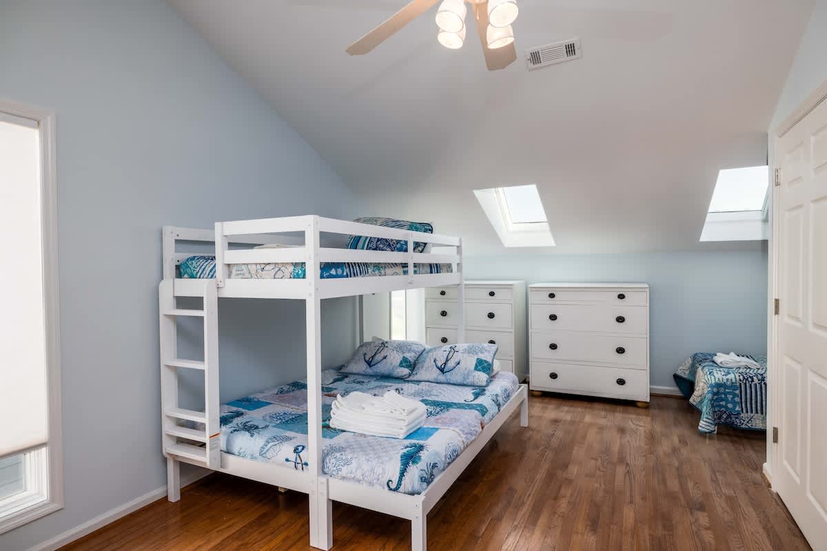 Second floor bunk room with ample guest sleeping arrangements