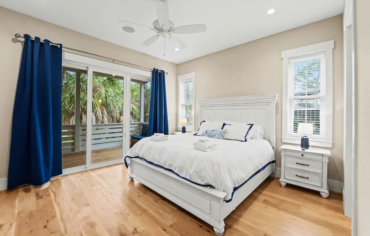 Primary Bedroom on First Floor with King Bed, En-Suite and Access to Back Deck 