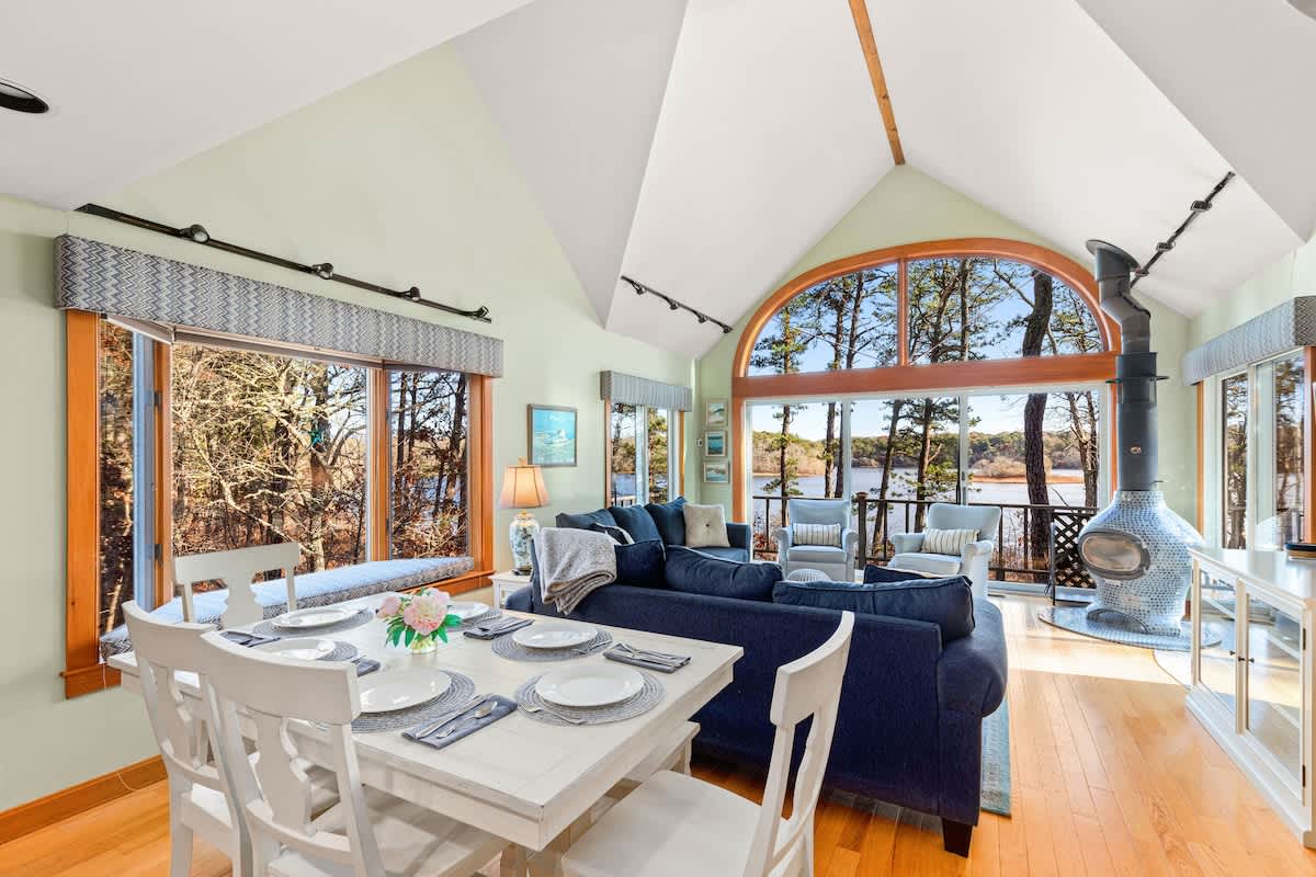 Stunning Lakefront Estate with a Private Beach Tennis Court Game Room