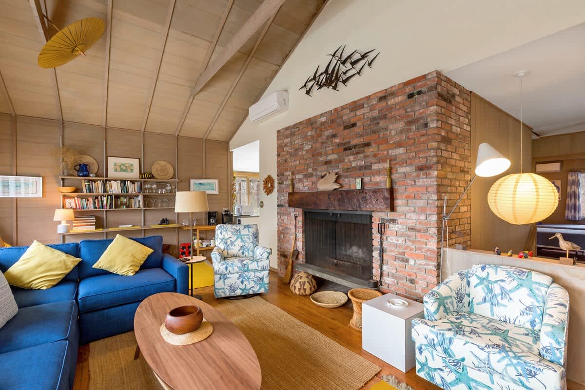 Enjoy this gorgeous, newly decorated living room with vaulted ceilings