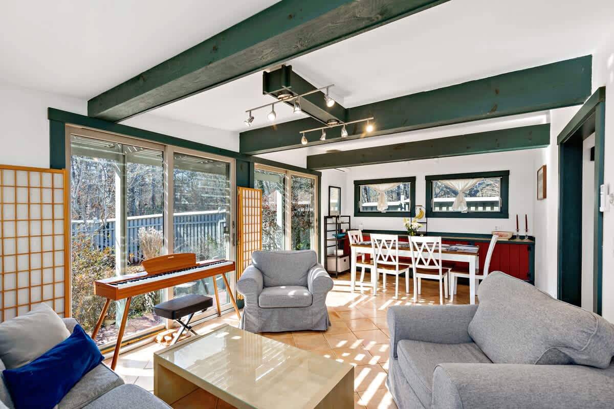 Enjoy an open concept lounging and dining room bathed in sunlight