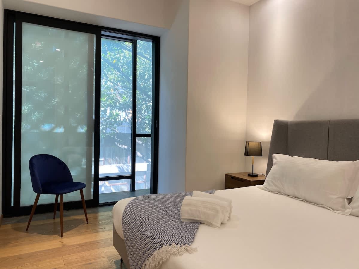 1st bedroom with outdoor view