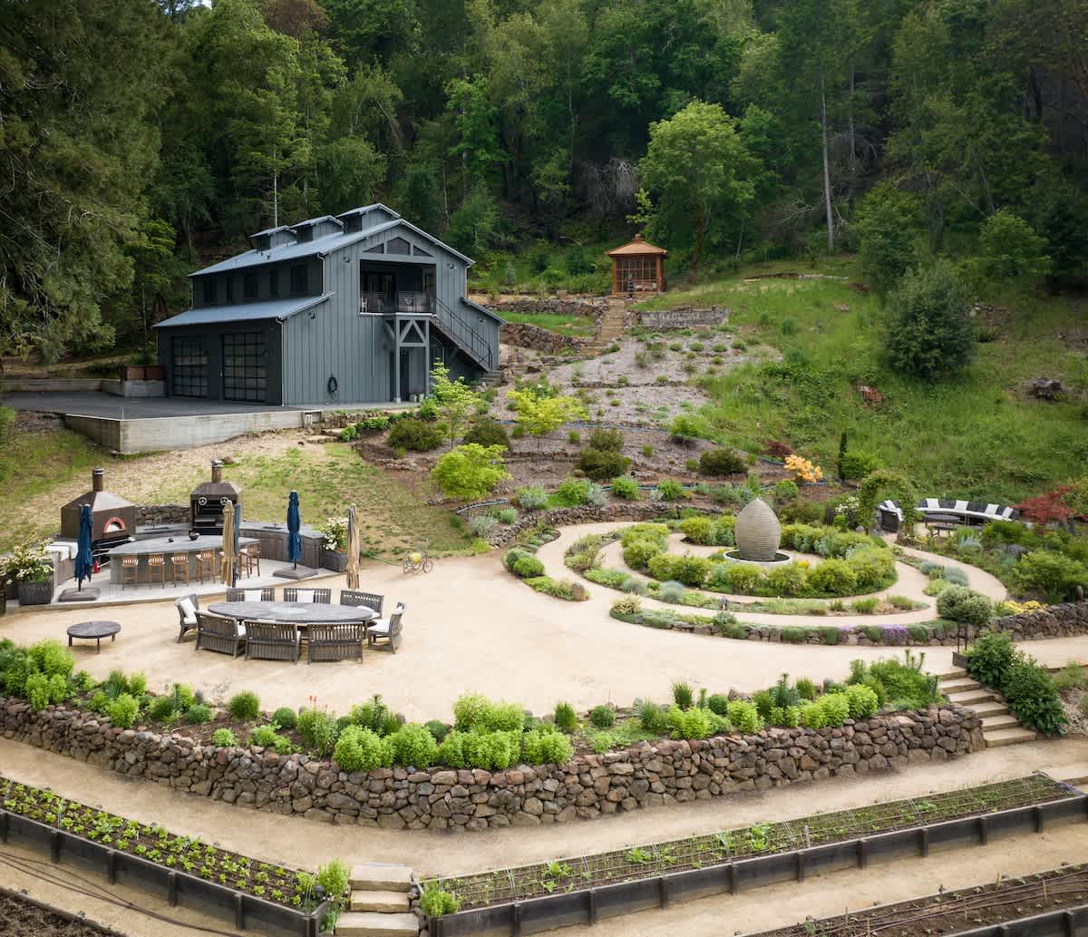 Labyrinth, family table, wood-fired oven, oh my! (The Barn in the background can be rented separately for large group stays; you’ll have access to all the outdoor spaces). 

Possible to add another 2 bedrooms to your booking