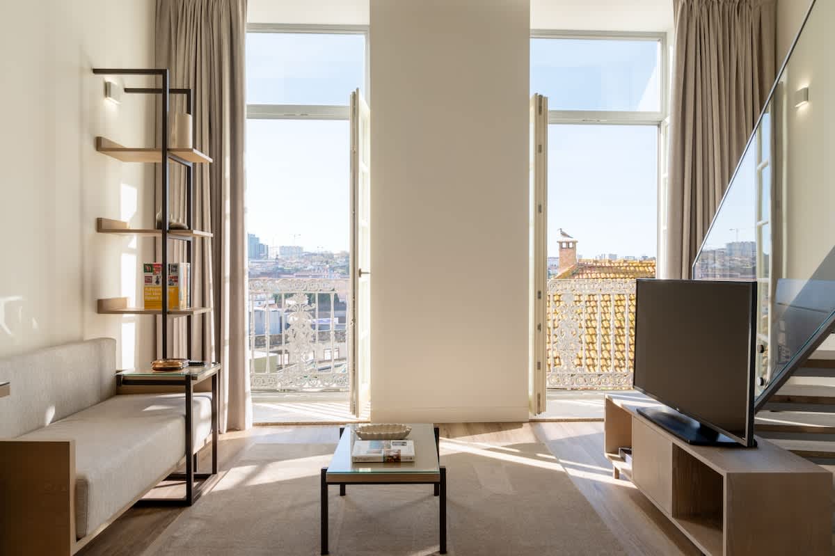 Chic Palace Duplex w/ Balcony by HostWise