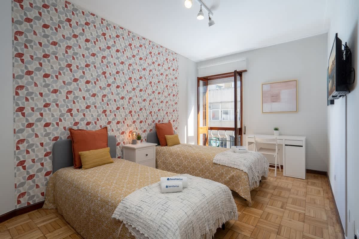 Prized Spacious Flat | Balcony by HostWise