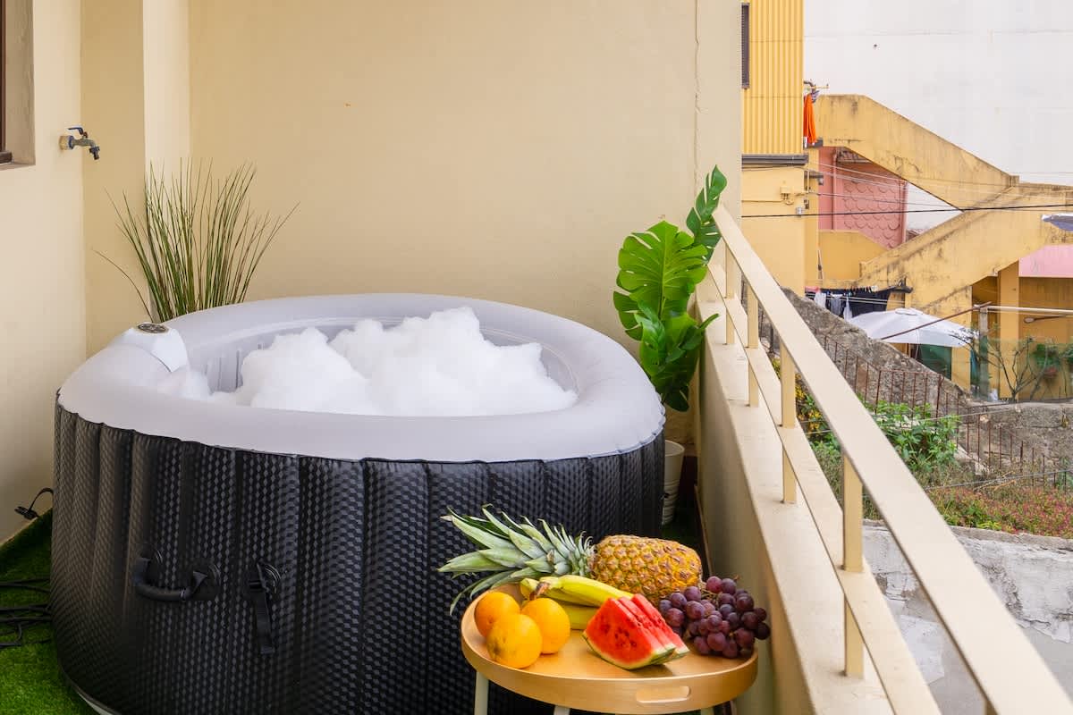 Two Trendy Bright Flats | Jacuzzi by HostWise