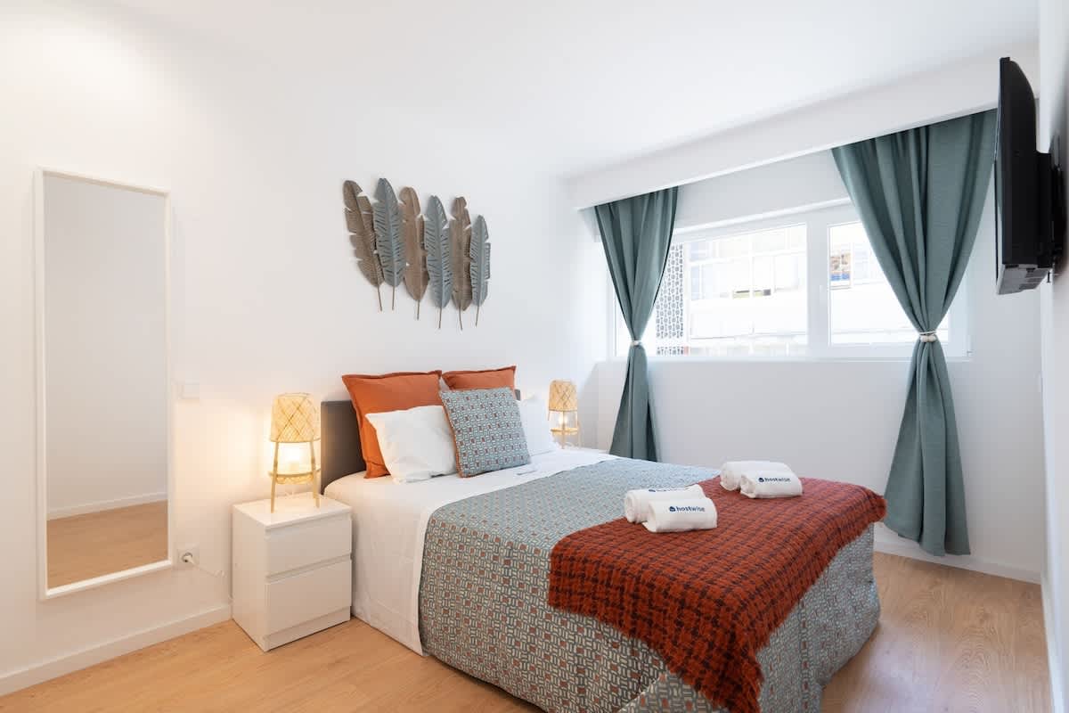 Sunny Cozy Flat w/ Balcony by HostWise