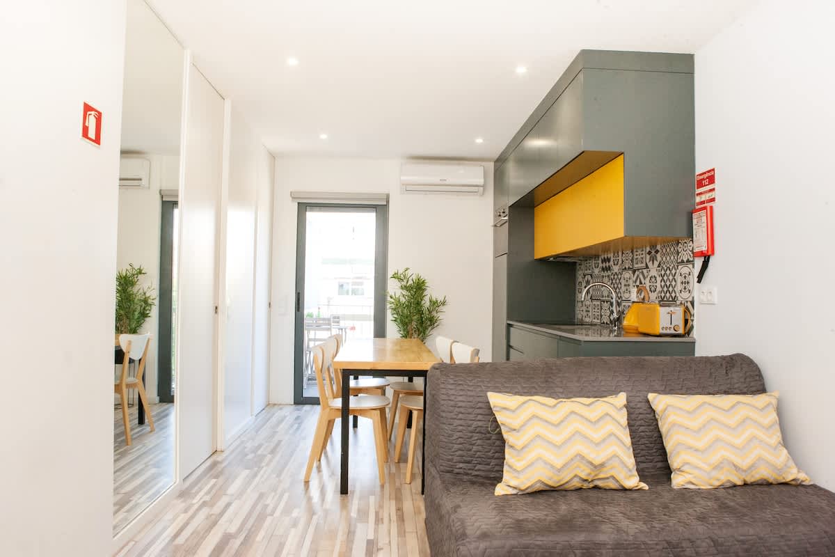 Charming Urban Flat w/ Balcony by HostWise