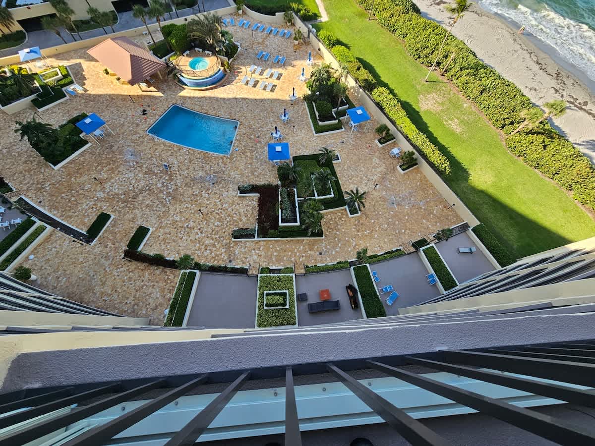 Balcony view of Pool, Hot Tub, and Beach — photo 5
