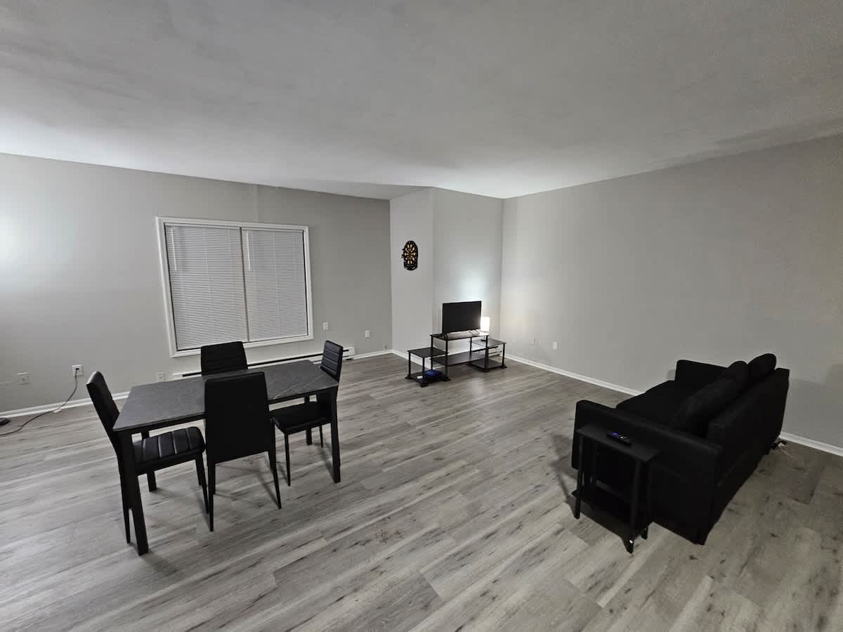 Open concept living room and dining room  — photo 6
