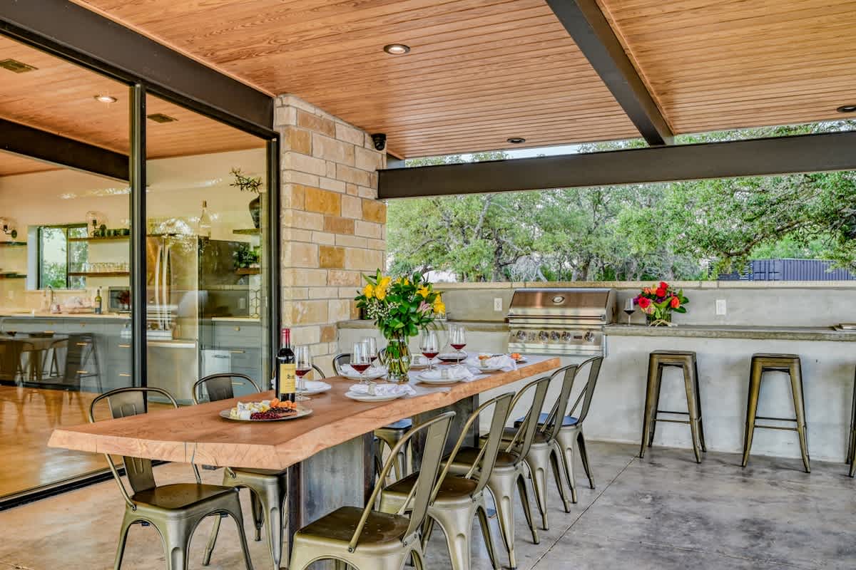 Gather with family and friends and enjoy a delicious meal in the beauty of nature at our inviting outdoor dining table.