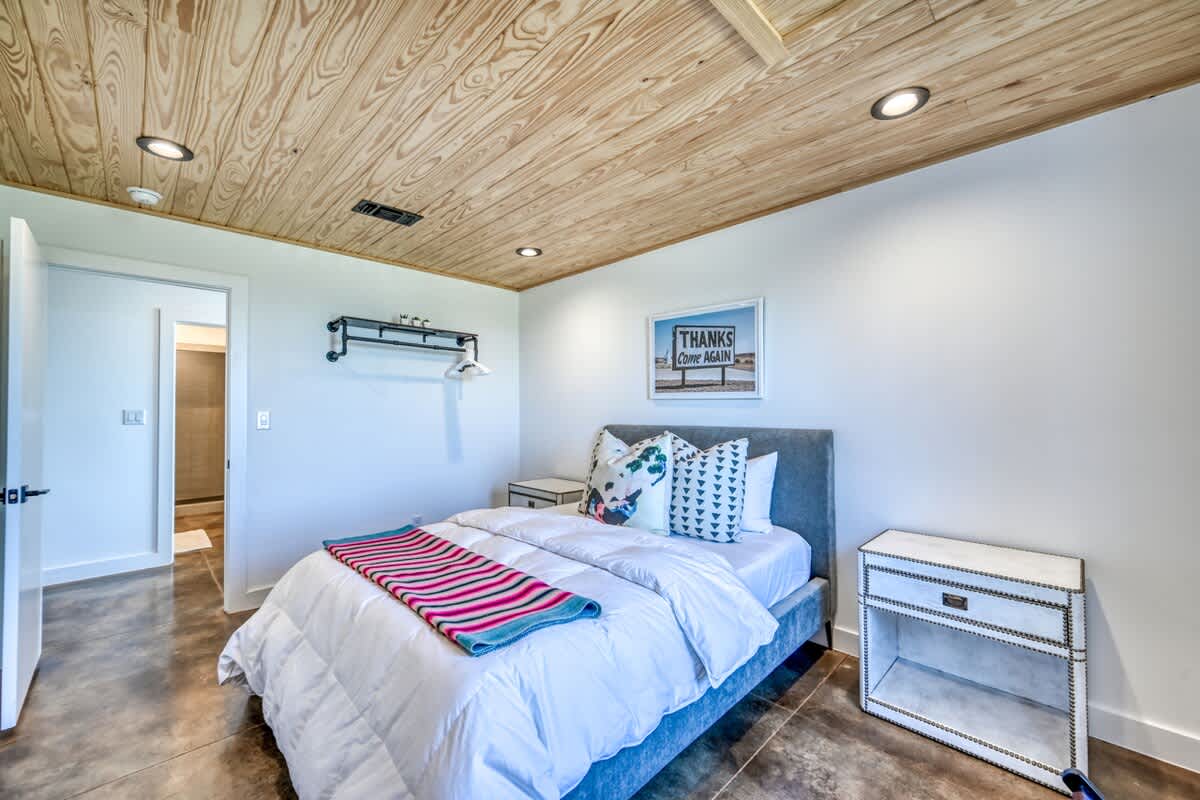 Second Bedroom: Sink into the soft linens of the queen bed and let yourself relax in the tranquil environment.