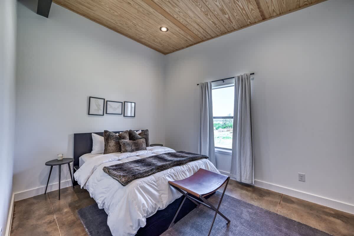 Third Bedroom: Sleep in style and comfort in our tasteful and cozy queen bed.
